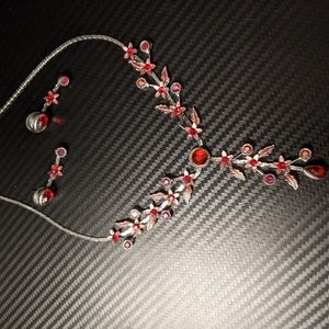 Silver ruby necklace with earrings